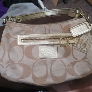 Coach tan and gold purse